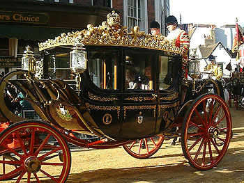 Queen Margrethe's Carriage accompanied by the Queen